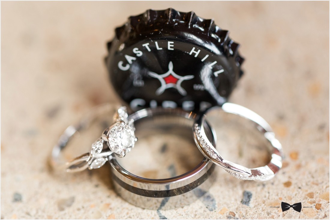 Castle Hill Cider Wedding - rings and bottle cap